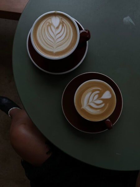 Two cups of coffee on a table